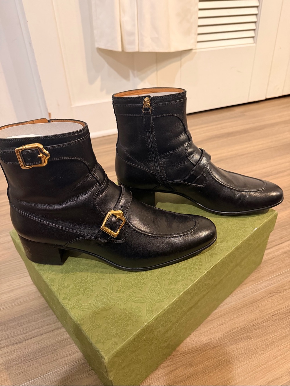 Gucci Black Leather Ankle Boots with Gold Buckle Accents